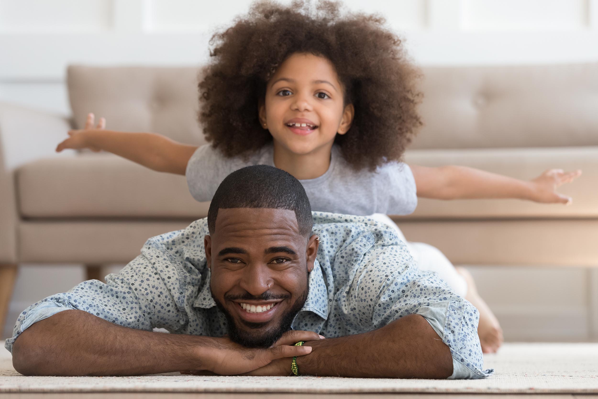 daughter and father playing after a dental exam 2