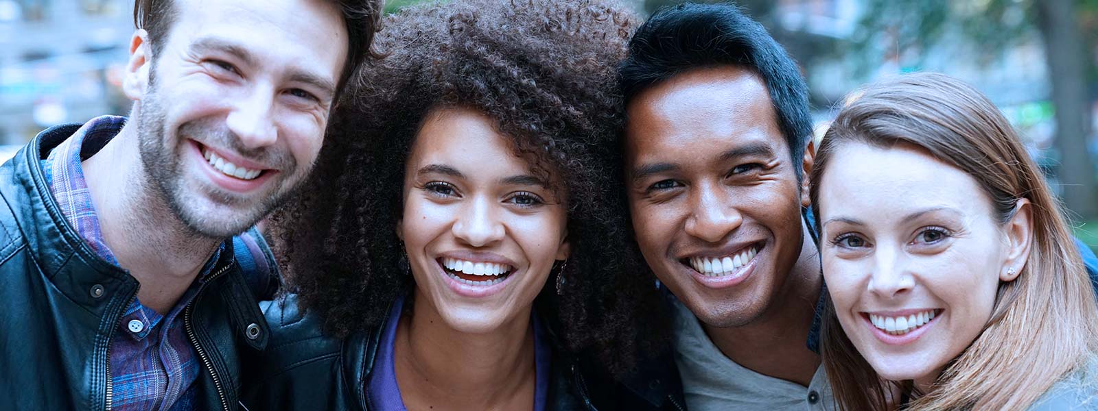 friends happily smiling after teeth whitening