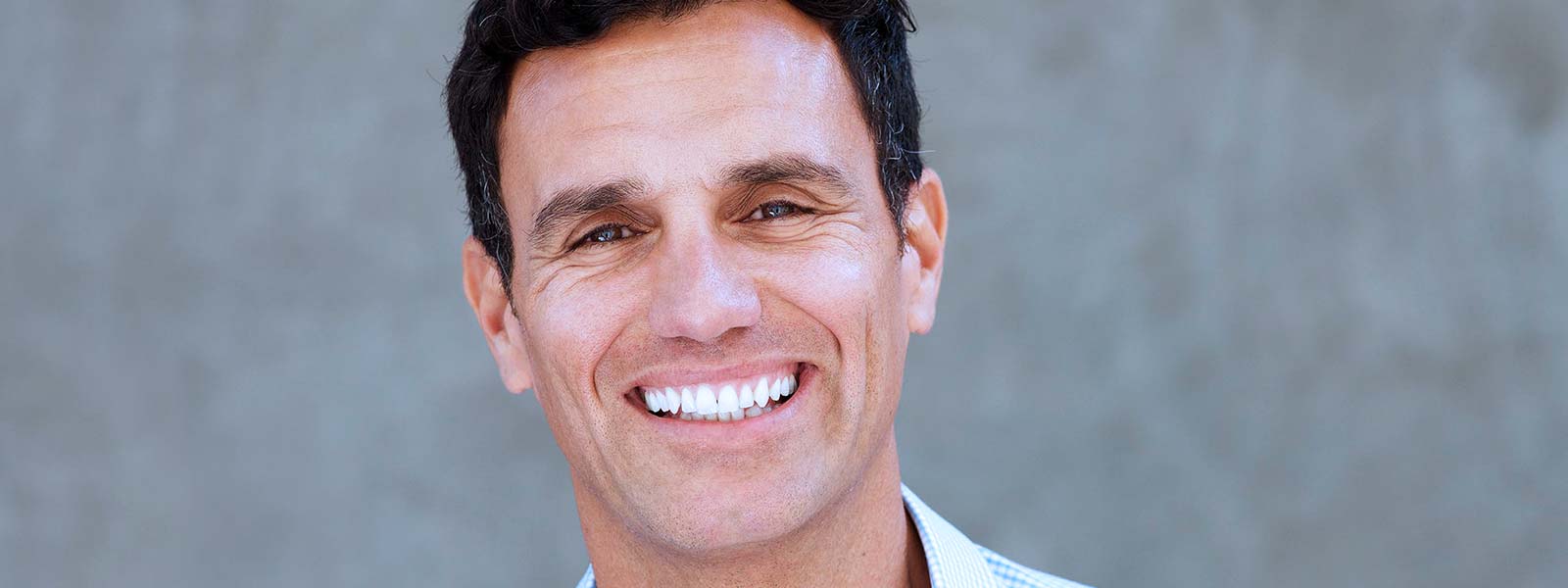 man smiling after dental exam