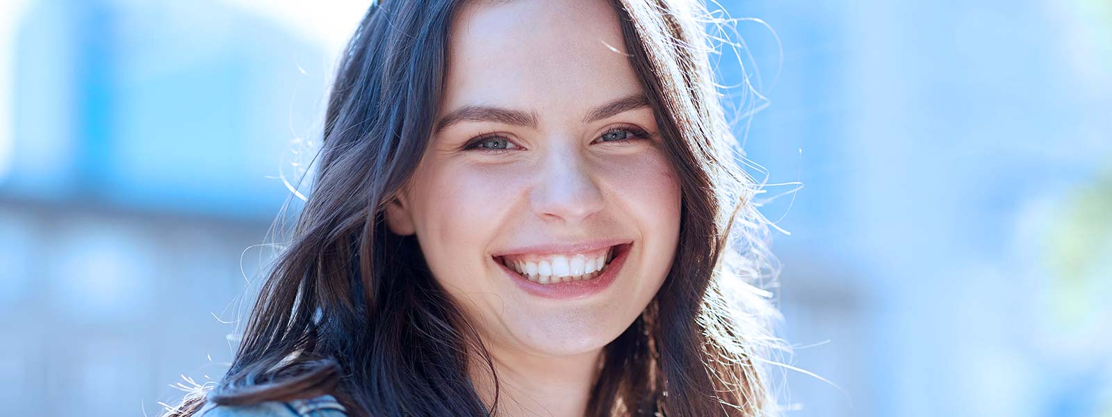 woman smiling after Invisalign